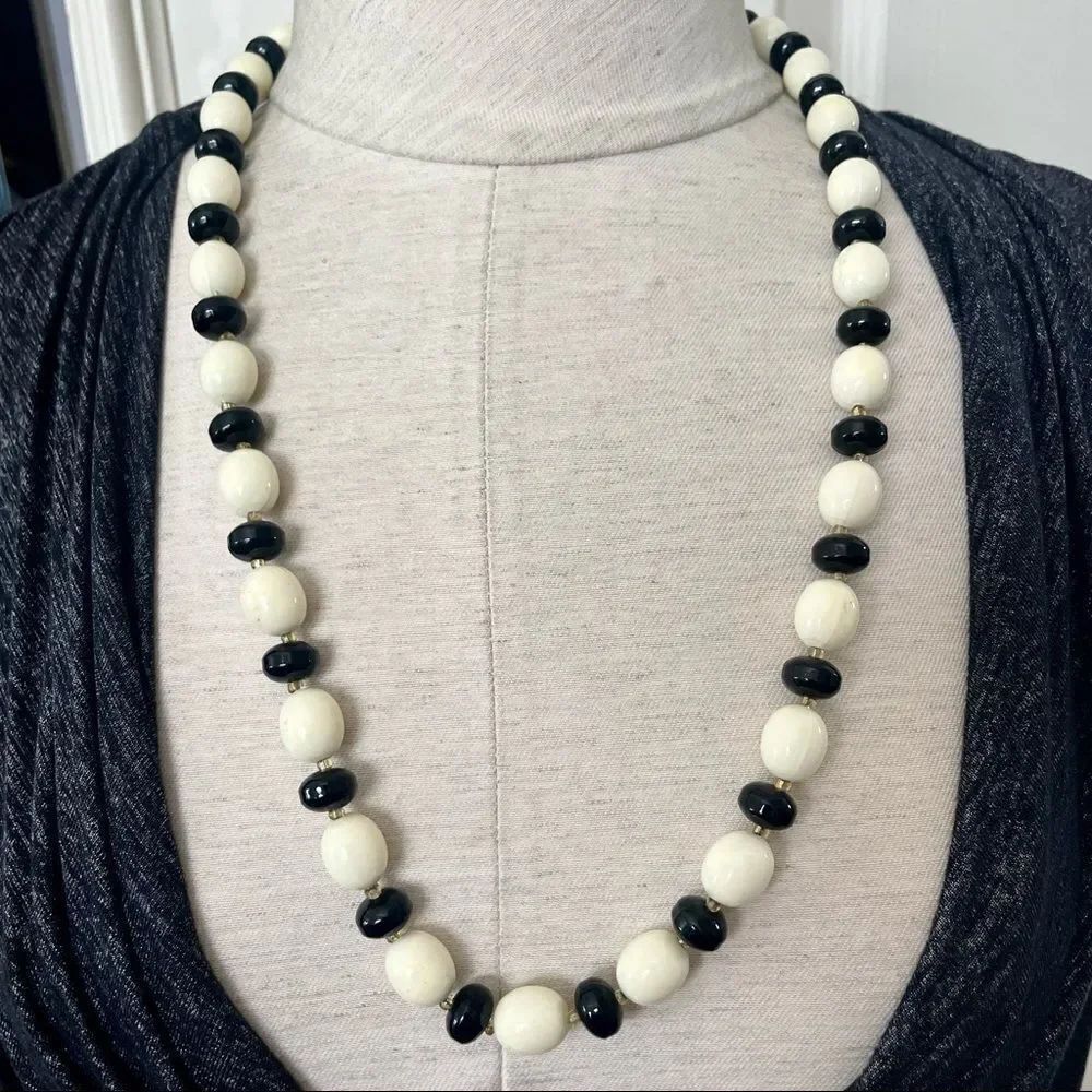 Long  black and cream beaded necklace